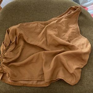 Super cute nude brown crop top, goes over the right shoulder